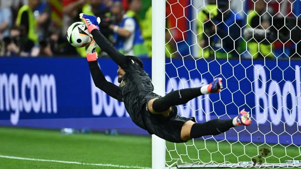 Diogo Costa of Portugal saves the third penalty from Benjamin Verbic of Slovenia (not pictured) in the penalty shoot out during the UEFA EURO 2024 round of 16 match between Portugal and Slovenia at Frankfurt Arena on July 01, 2024 in Frankfurt am Main, Germany.
