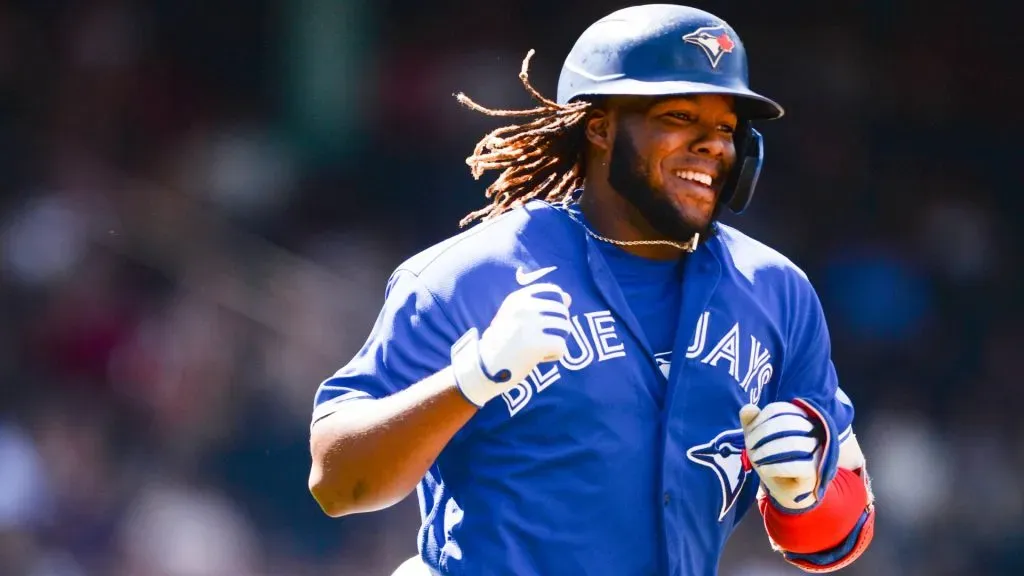Vladimir Guerrero Jr. #27 of the Toronto Blue Jays celebrates after hitting a two-run home run in the seventh inning against the Boston Red Sox at Fenway Park. Photo by Kathryn Riley/Getty Images