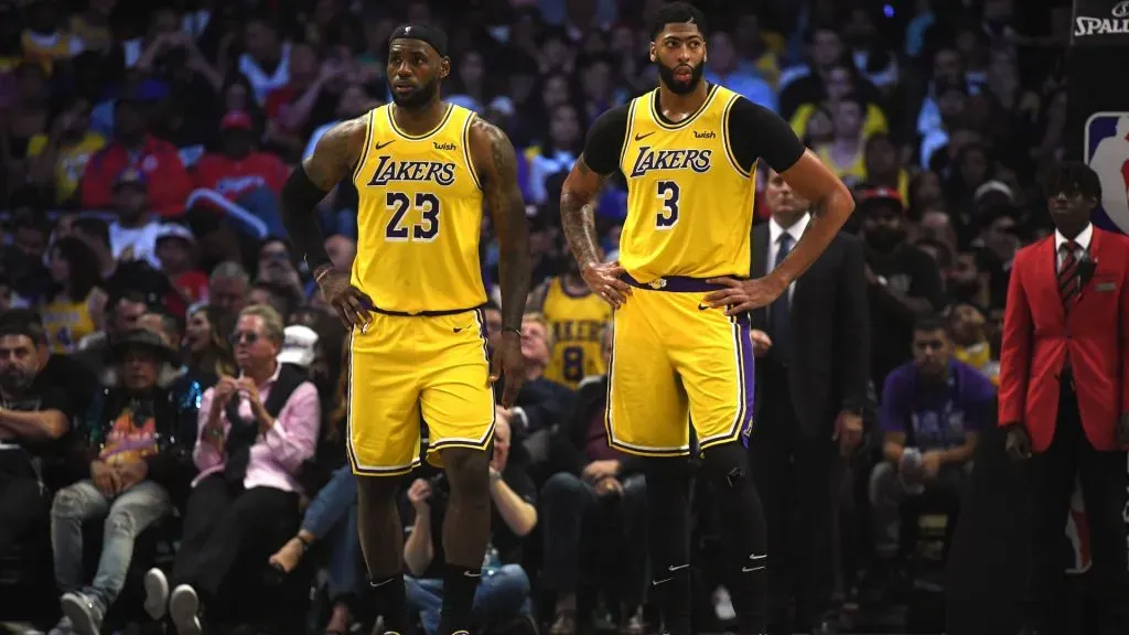 LeBron James #23 and Anthony Davis #3 of the Los Angeles Lakers reacts as they trail the LA Clippers during the fourth quarter in a 112-102 Clippers win during the LA Clippers season home opener. Photo by Harry How/Getty Images