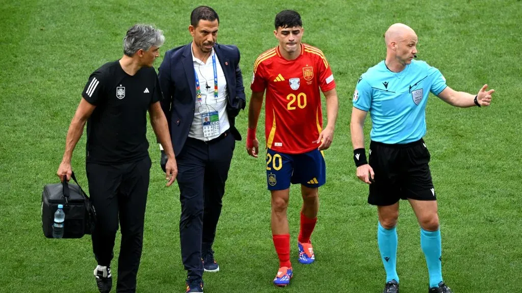 Pedri of Spain reacts as he leaves the field following medical treatment after picking up an injury. Clive Mason/Getty Images