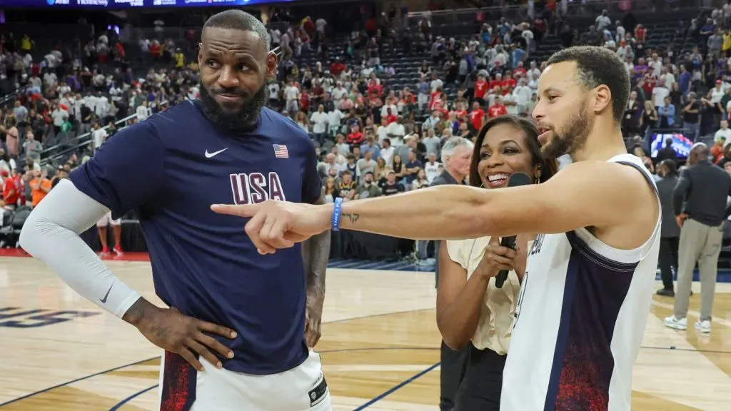 LeBron James (L) #6 and Stephen Curry #4 of the United States are interviewed on the court by Kristina Pink of Fox Sports after the team’s 86-72 victory over Canada in their exhibition game ahead of the Paris Olympic Games. Photo by Ethan Miller/Getty Images.