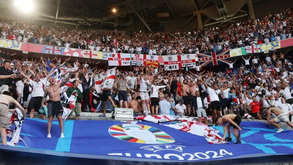 A general view as fans of England celebrate following the team’s victory in the penalty shoot-out during the UEFA EURO 2024 quarter-final match between England and Switzerland at Düsseldorf Arena on July 06, 2024 in Dusseldorf, Germany. Photo by Richard Pelham/Getty Images