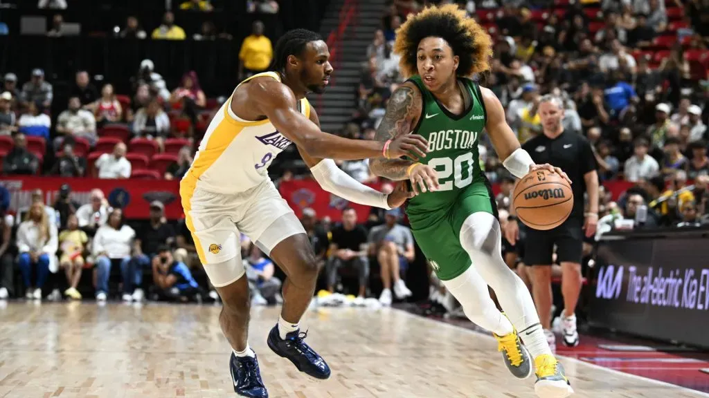 JD Davison #20 of the Boston Celtics drives past Bronny James Jr. #9 of the Los Angeles Lakers in the first half of a NBA Summer League game. Candice Ward/Getty Images