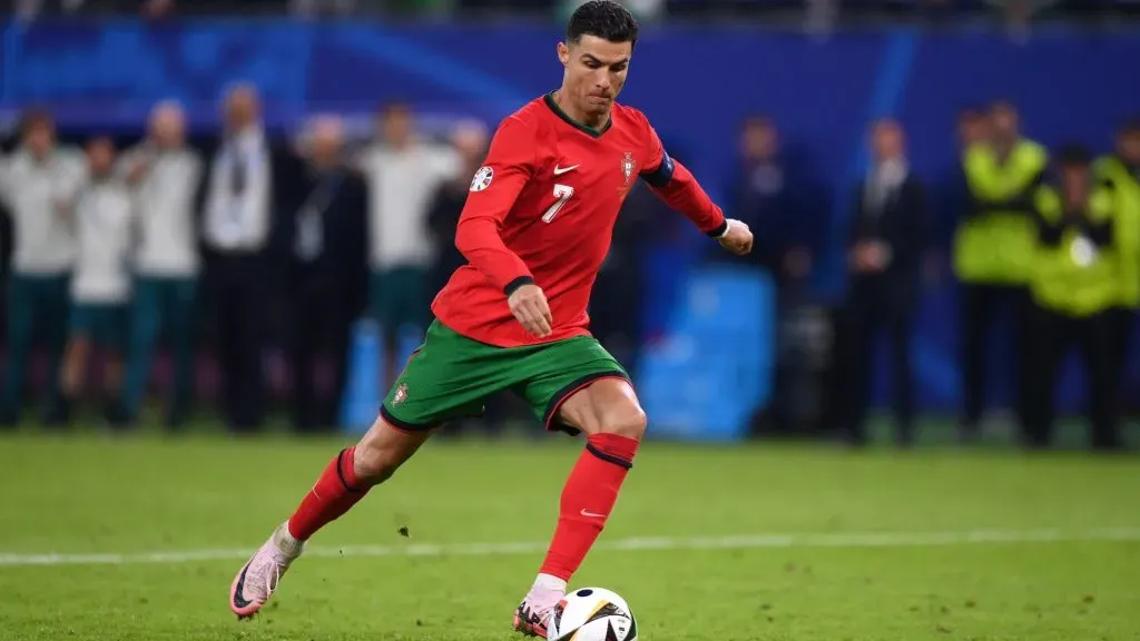 Cristiano Ronaldo of Portugal takes a penalty in the shoot-out during the UEFA EURO 2024 quarter-final match between Portugal and France at Volksparkstadion on July 05, 2024 in Hamburg, Germany. Photo by Justin Setterfield/Getty Images