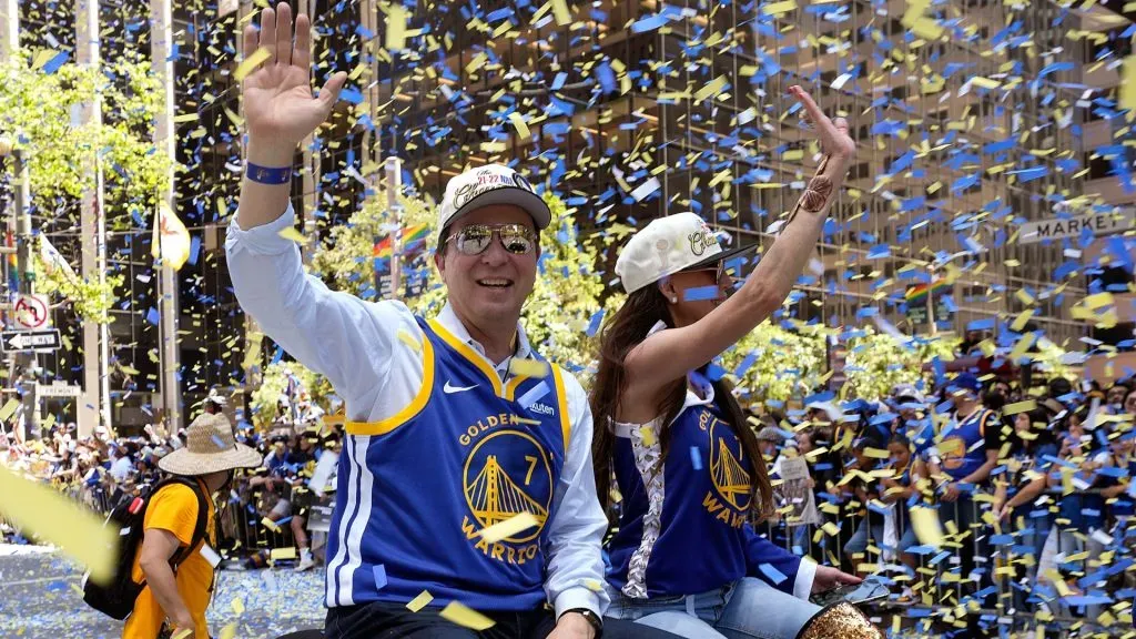 Owner Joe Lacob of the Golden State Warriors waves to fans during the Golden State Warriors Victory Parade on June 20, 2022 in San Francisco, California. The Golden State Warriors beat the Boston Celtics 4-2 to win the 2022 NBA Finals. Photo by Thearon W. Henderson/Getty Images