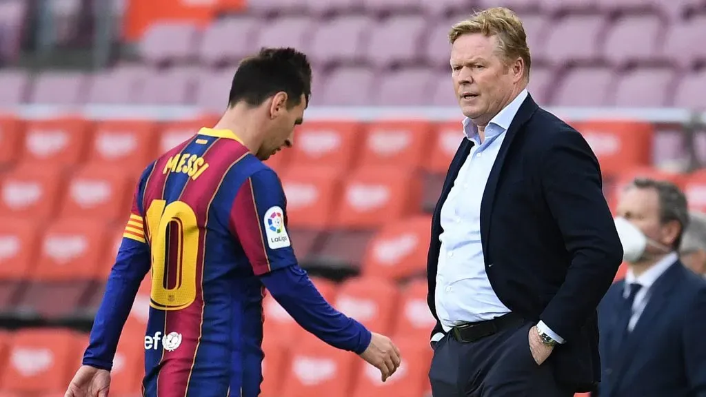 Lionel Messi of FC Barcelona and Ronald Koeman, Head coach of FC Barcelona look dejected following the La Liga Santander match between FC Barcelona and RC Celta at Camp Nou on May 16, 2021 in Barcelona, Spain. Photo by David Ramos/Getty Images