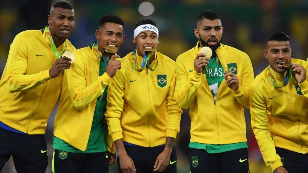 Neymar and Brazilian team mates celebrate with their gold medals after winning the Men’s Football Final between Brazil and Germany at the Maracana Stadium on Day 15 of the Rio 2016 Olympic Games on August 20, 2016 in Rio de Janeiro, Brazil. Photo by Laurence Griffiths/Getty Images