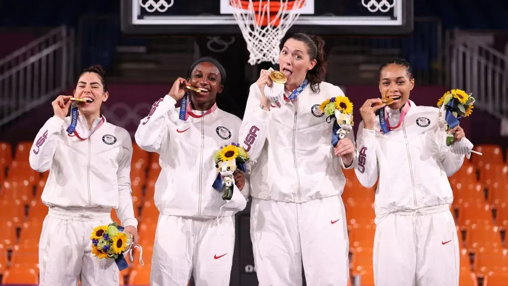 Gold medalists Kelsey Plum, Jacquelyn Young, Stefanie Dolson and Allisha Gray of Team United States pose on the podium during the medal ceremony for in the 3×3 Basketball competition of the Tokyo 2020 Olympic Games. Christian Petersen/Getty Images