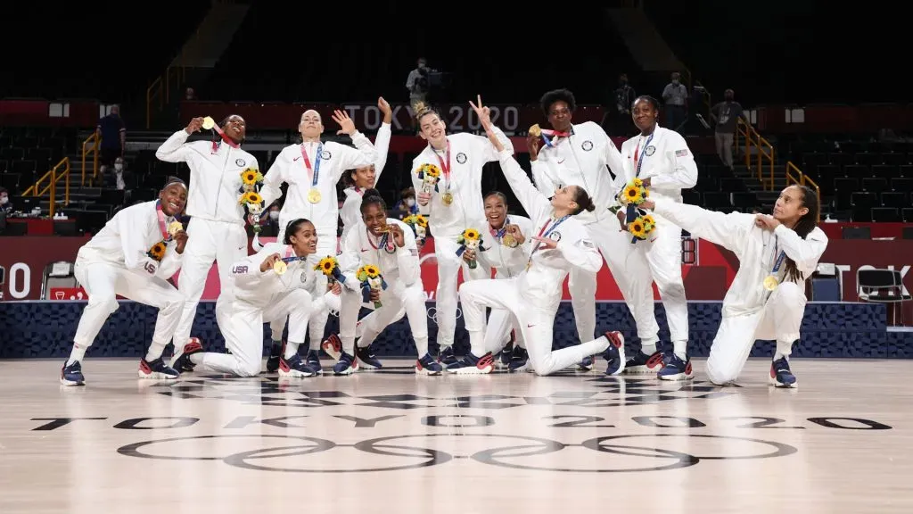 Team United States pose for photographs with their gold medals during the Women’s Basketball medal ceremony of the 2020 Tokyo Olympic games. Gregory Shamus/Getty Images