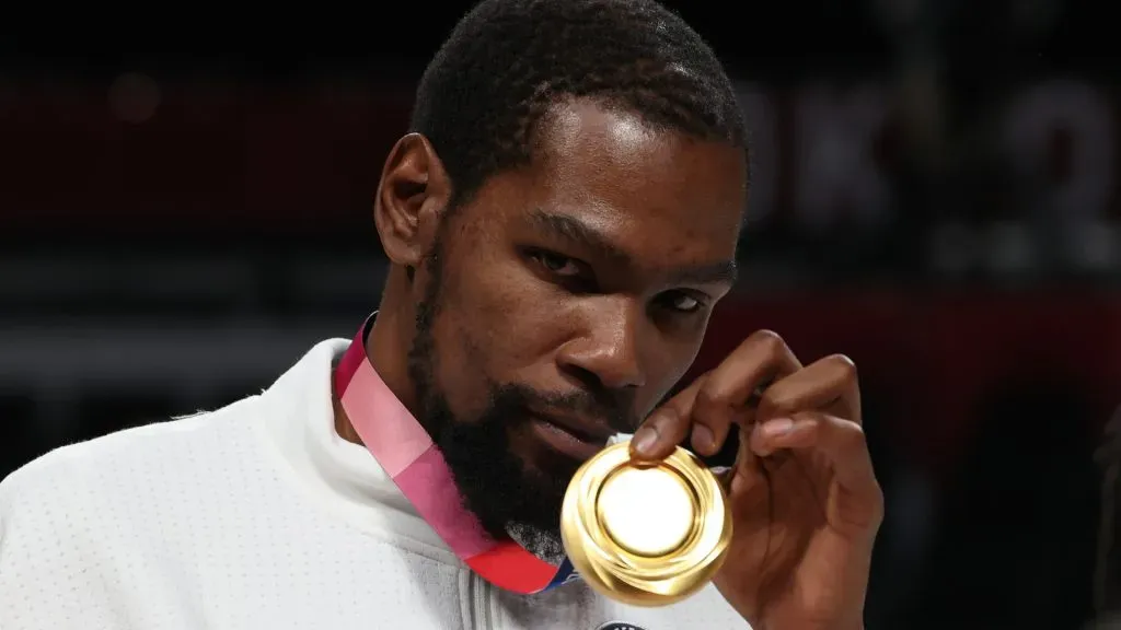 Kevin Durant of Team United States poses for photographs with his gold medal during the Men’s Basketball medal ceremony on day fifteen of the Tokyo 2020 Olympic Games at Saitama Super Arena on August 07, 2021 in Saitama, Japan.
