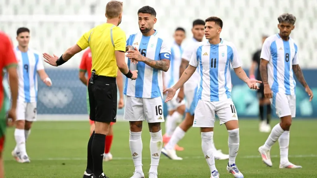 Nicolas Otamendi #16 of Team Argentina reacts towards Referee Glenn Nyberg after VAR disallowed Team Argentina’s second goal during the Men’s group B match between Argentina and Morocco during the Olympic Games Paris 2024 at Stade Geoffroy-Guichard on July 24, 2024 in Saint-Etienne, France. (Photo by Tullio M. Puglia/Getty Images)