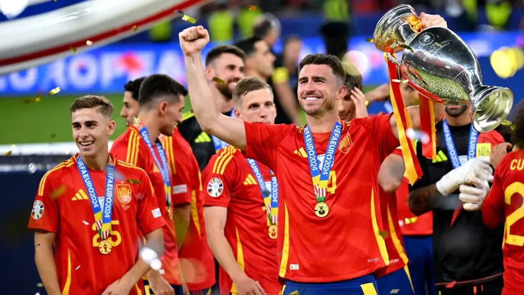 Aymeric Laporte of Spain celebrates with the UEFA Euro 2024 Henri Delaunay Trophy after his team’s victory during the UEFA EURO 2024 final match between Spain and England at Olympiastadion on July 14, 2024 in Berlin, Germany. (Photo by Dan Mullan/Getty Images)