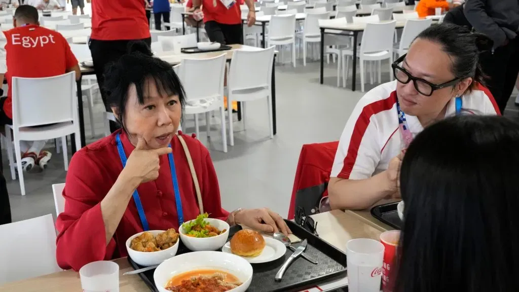 President of the Republic of Singapore Tharman Shanmugaratnam’s wife Jane Yumiko Ittogi shares a lunch with Singapore’s athletes during her visit at the Olympic Village at the 2024 Summer Olympics on July 24, 2024, in Paris, France. (Photo by Michel Euler – Pool/Getty Images)