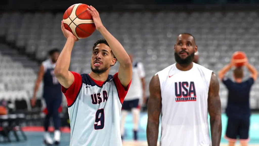 Tyrese Haliburton of Team United States takes a shot next to team mate LeBron James during the Basketball training session ahead of the Paris 2024 Olympic Games on July 24, 2024 in Lille, France. (Photo by Gregory Shamus/Getty Images)