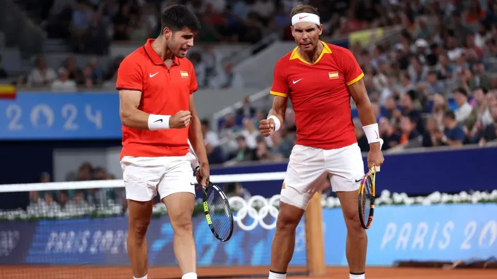 Rafael Nadal and Carlos Alcaraz of Team Spain celebrate against Andres Molteni and Maximo Gonzalez of Team Argentina during the Men’s Doubles first round match on day one of the Olympic Games Paris 2024. Clive Brunskill/Getty Images