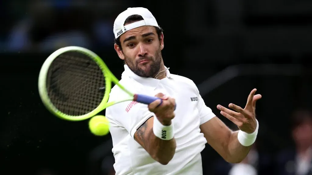 Matteo Berrettini of Italy plays a forehand against Jannik Sinner of Italy in his Gentlemen’s Singles second round match during day three of The Championships Wimbledon 2024. Clive Brunskill/Getty Images