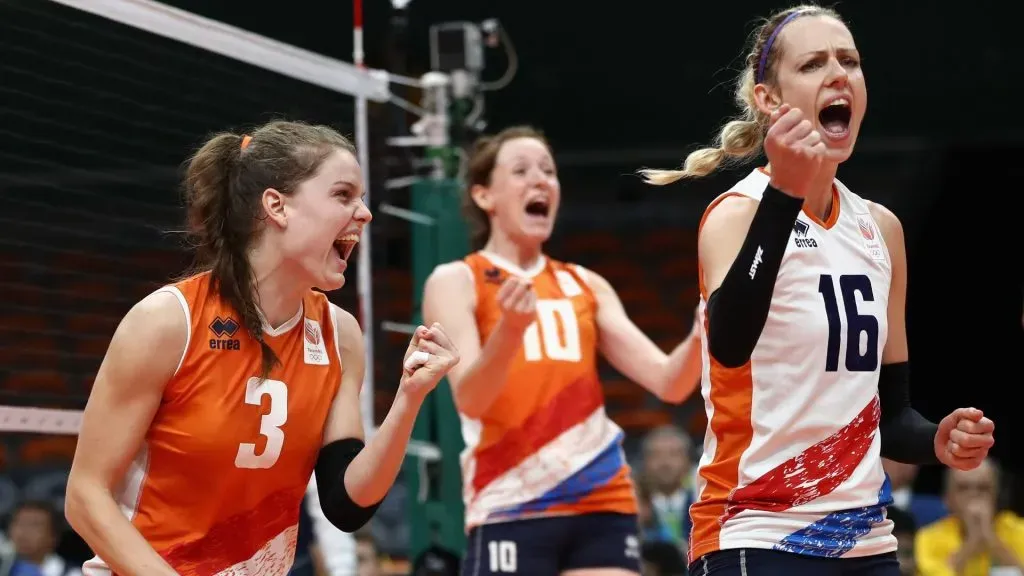 Debby Stam-Pilon #16, Lonneke Sloetjes #10 and Yvon Belien #3 of Netherlands celebrate a point during the Women’s Bronze Medal Match between Netherlands and the United States on Day 15 of the Rio 2016 Olympic Games at the Maracanazinho on August 20, 2016 in Rio de Janeiro, Brazil.