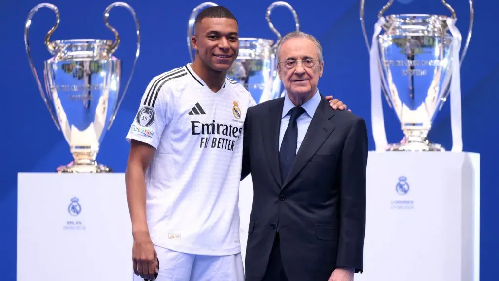 Real Madrid new signing, Kylian Mbappe poses for a photo with Florentino Perez Rodriguez, President of Real Madrid as he is unveiled at Estadio Santiago Bernabeu. David Ramos/Getty Images