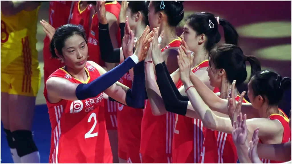 Zhu Ting (1st L) of China cheers up with teammates – IMAGO / Xinhua