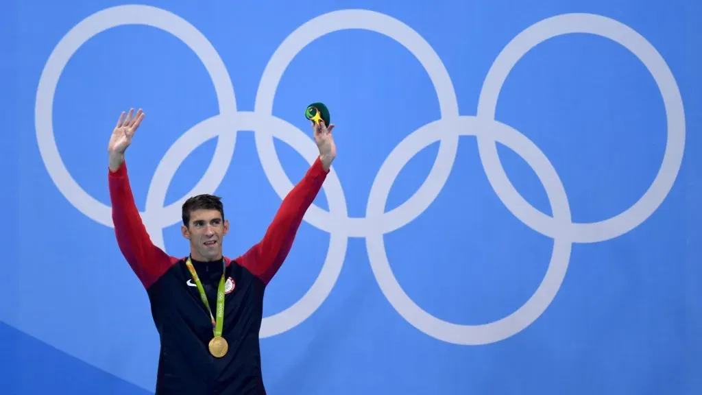 Gold medalist Michael Phelps of the United States poses on the podium during the medal ceremony for the Men’s 200m Butterfly Final on Day 4 of the Rio 2016 Olympic Games. David Ramos/Getty Images