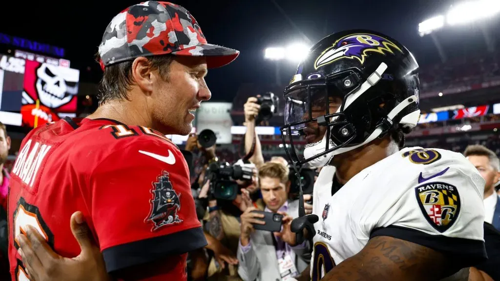 Tom Brady #12 of the Tampa Bay Buccaneers and Lamar Jackson #8 of the Baltimore Ravens meet on the field after their game at Raymond James Stadium on October 27, 2022 in Tampa, Florida.