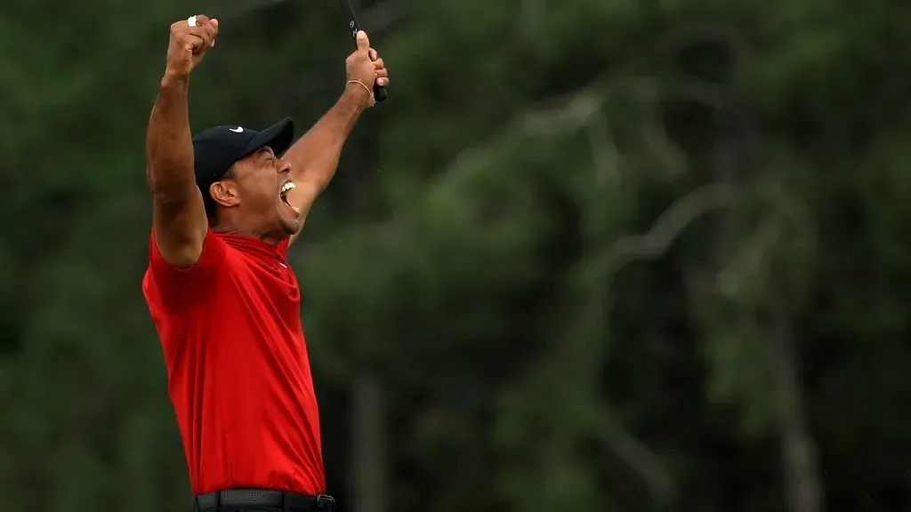 Tiger Woods of the United States celebrates winning the Masters during the final roubnd at Augusta National Golf Club on April 14, 2019 in Augusta, Georgia.