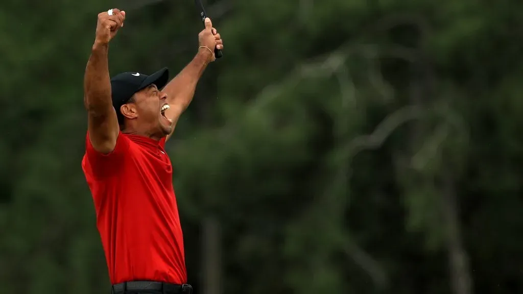 Why is Tiger Woods not playing at the Paris 2024 Olympic Games