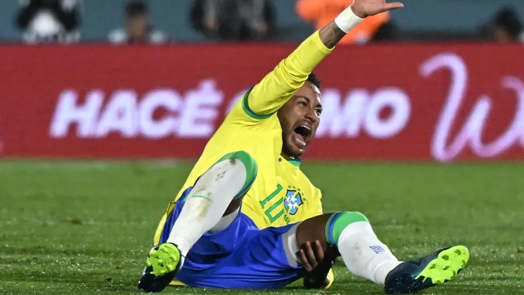 Neymar Jr. of Brazil reacts after being injured during the FIFA World Cup 2026 Qualifier match between Uruguay and Brazil at Centenario Stadium on October 17, 2023 in Montevideo, Uruguay. (Photo by Guillermo Legaria/Getty Images)