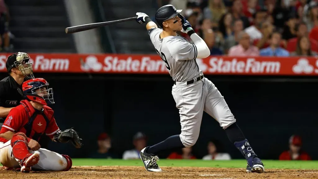 Aaron Judge #99 of the New York Yankees hits his 50th home run of the season against the Los Angeles Angels during the eighth inning at Angel Stadium of Anaheim on August 29, 2022 in Anaheim, California. (Photo by Michael Owens/Getty Images)