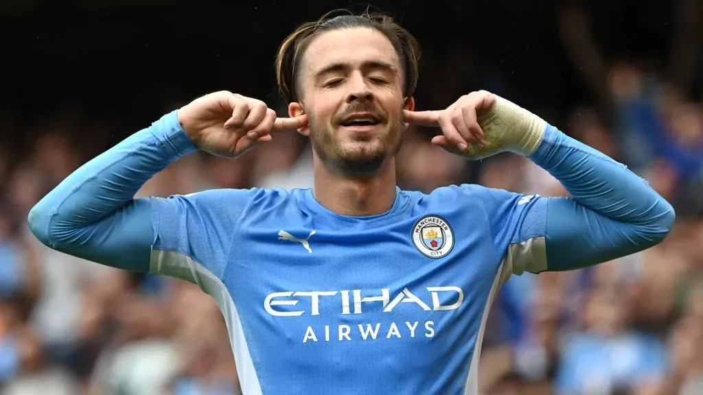 Jack Grealish of Manchester City celebrates after scoring during the Premier League match between Manchester City and Norwich City at Etihad Stadium on August 21, 2021 in Manchester, England.