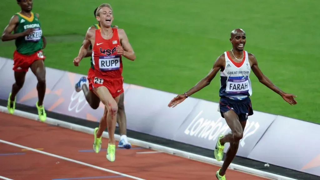 Mohamed Farah of Great Britain crosses the line to win gold in the Men’s 10,000m Final on Day 8 of the London 2012 Olympic Games at Olympic Stadium on August 4, 2012 in London, England. (Photo by Harry How/Getty Images)