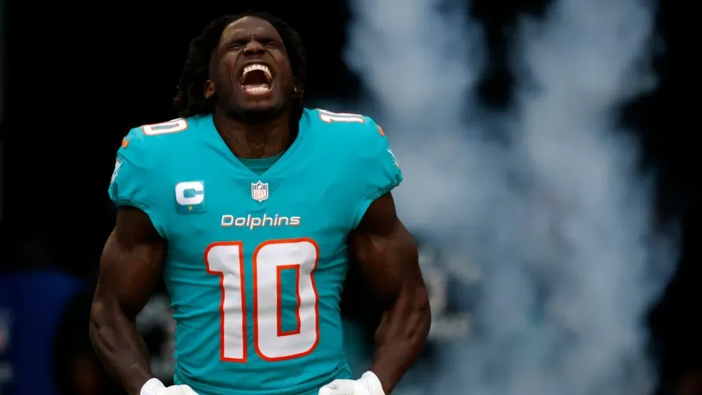 Wide receiver Tyreek Hill #10 of the Miami Dolphins takes the field at Hard Rock Stadium on January 08, 2023 in Miami Gardens, Florida.