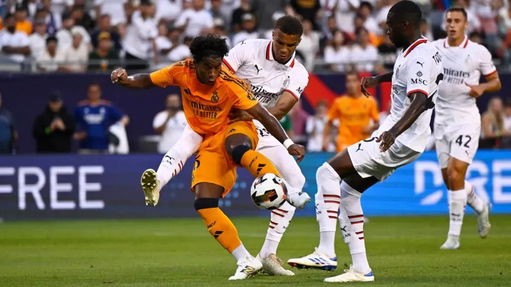 Endryck Moreira #16 of Real Madrid takes a shot at goal in the first half of a friendly soccer match between AC Milan and Real Madrid. Quinn Harris/Getty Images