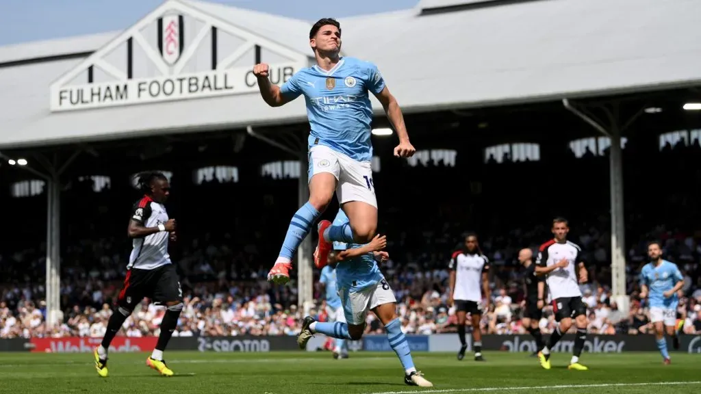 Julian Alvarez of Manchester City celebrates scoring his team’s fourth goal from the penalty spot during the Premier League match between Fulham FC and Manchester City. (Photo by Justin Setterfield/Getty Images)