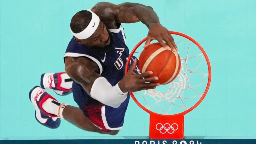 Lebron James #6 of Team United States dunks the ball during a Men’s basketball group phase-group C game between the United States and Puerto Rico. Pool/Getty Images
