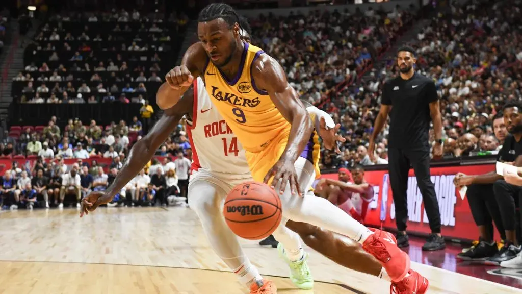Bronny James Jr. #9 of the Los Angeles Lakers dribbles baseline past AJ Griffin #14 of the Houston Rockets in the first half of a 2024 NBA Summer League game. Candice Ward/Getty Images