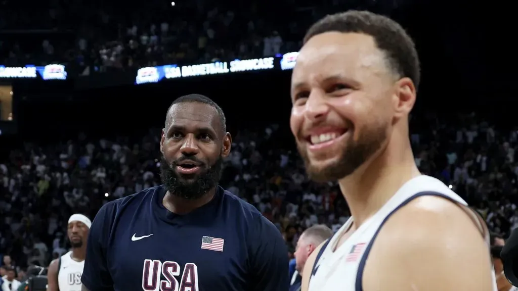 LeBron James #6 and Stephen Curry #4 of the United States after an exhibition game between the United States and Serbia ahead of the Paris Olympic Games at Etihad Arena on July 17, 2024 in Abu Dhabi, United Arab Emirates.