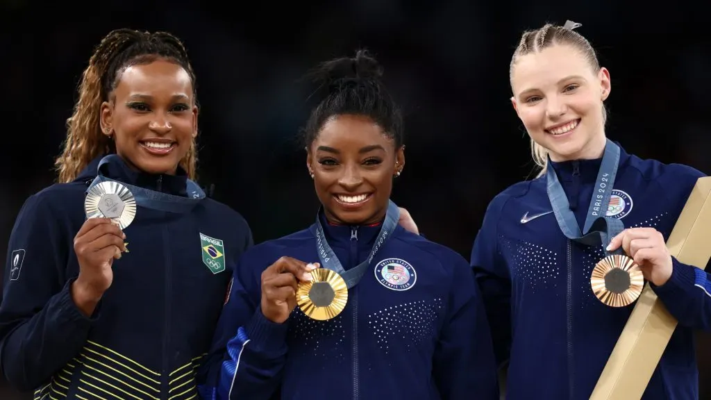 Silver medalist Rebeca Andrade of Team Brazil, Gold medalist Simone Biles of Team United States and Bronze medalist Jade Carey of Team United States pose with their medals after vault final. Naomi Baker/Getty Images
