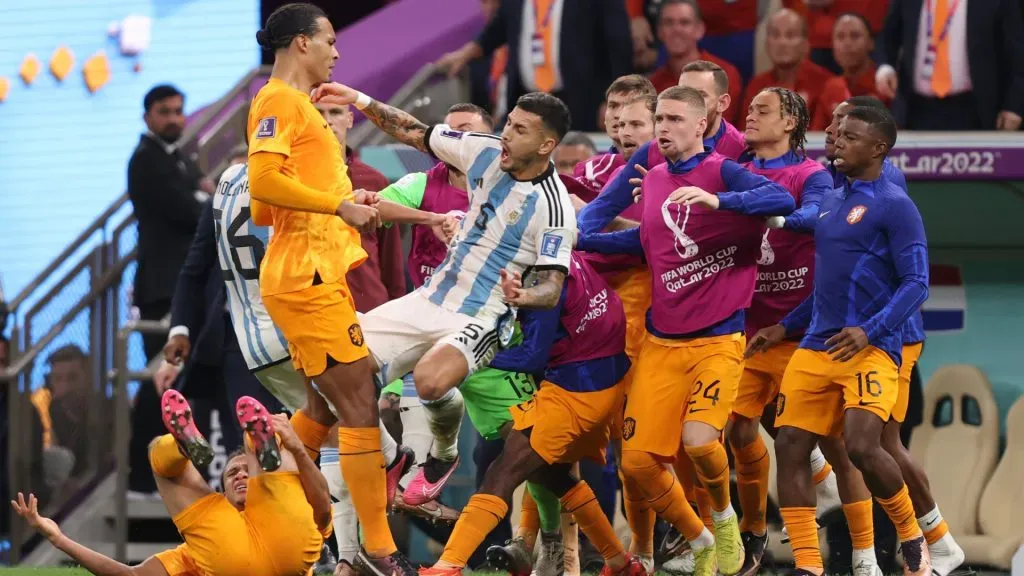 Virgil Van Dijk of Netherlands protests to Leandro Paredes of Argentina after kicking the ball toward Netherlands bench during the FIFA World Cup Qatar 2022 quarter final match. Julian Finney/Getty Images