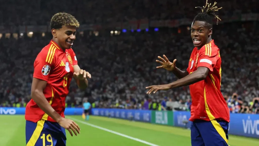 Nico Williams of Spain celebrates scoring his team’s first goal with teammate Lamine Yamal during the UEFA EURO 2024 final match between Spain and England at Olympiastadion on July 14, 2024 in Berlin, Germany.