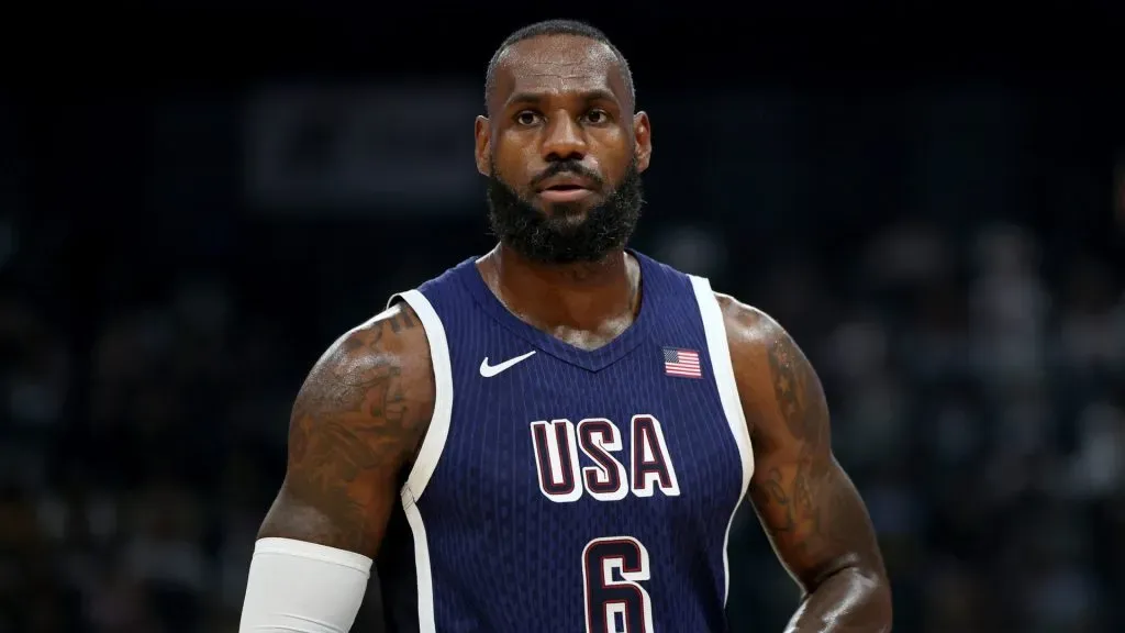 LeBron James #6 of the United States walks the court during the first half of an exhibition game between the United States and Australia ahead of the Paris Olympic Games at Etihad Arena on July 15, 2024 in Abu Dhabi, United Arab Emirates.