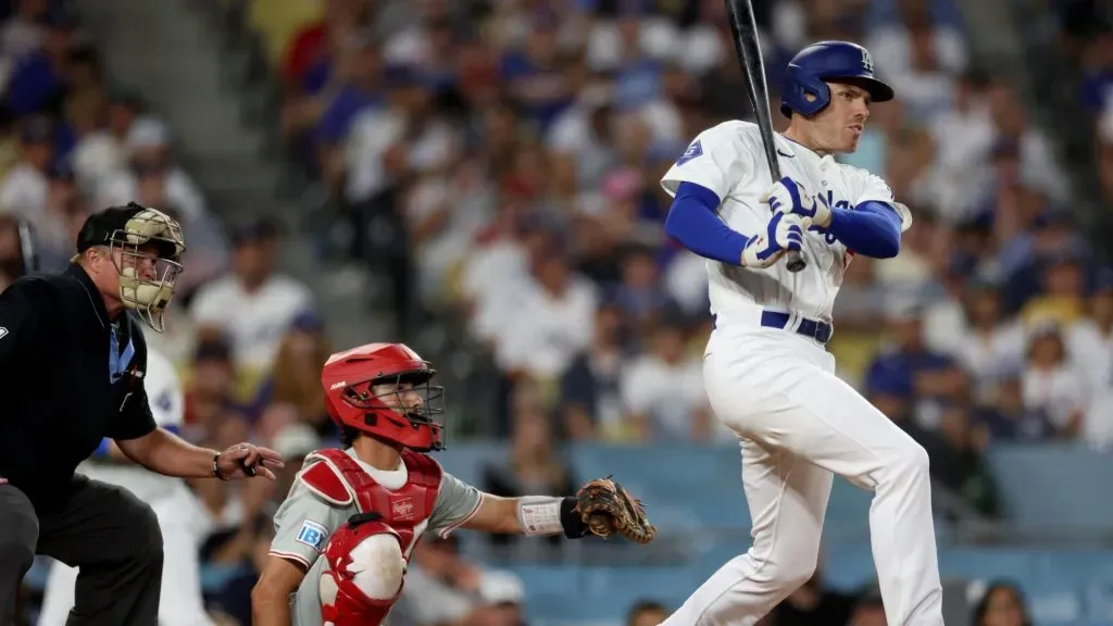 Freddie Freeman #5 of the Los Angeles Dodgers singles in front of Garrett Stubbs #21 of the Philadelphia Phillies during the third inning at Dodger Stadium. (Photo by Harry How/Getty Images)
