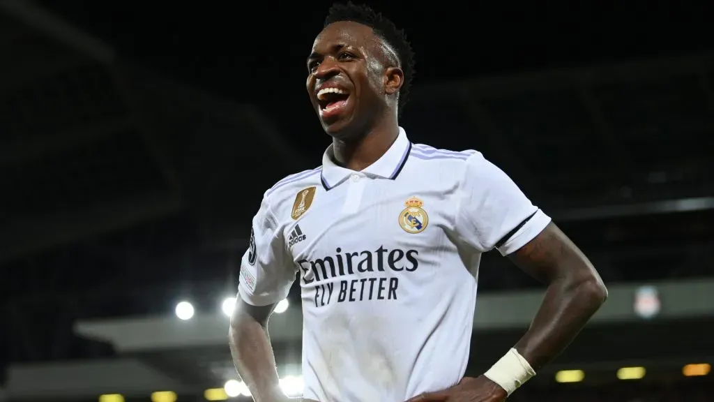 Vinicius Junior of Real Madrid celebrates after scoring the team’s second goal during the UEFA Champions League round of 16 leg one match between Liverpool FC and Real Madrid at Anfield on February 21, 2023 in Liverpool, England.