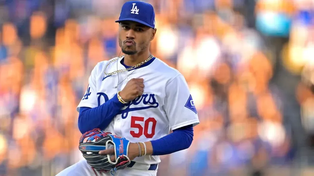 Mookie Betts #50 of the Los Angeles Dodgers reacts after making a play to throw Garrett Hampson #2 of the Kansas City Royals out at first in the fifth inning at Dodger Stadium on June 15, 2024 in Los Angeles, California. (Photo by Jayne Kamin-Oncea/Getty Images)