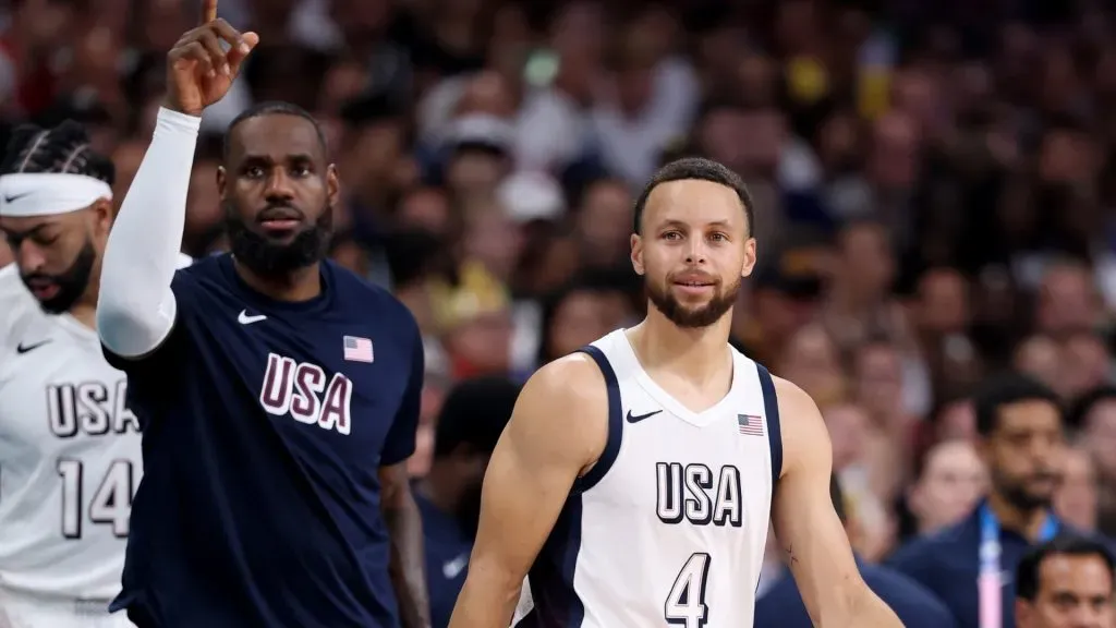 Lebron James #6 and Stephen Curry #4 of Team United States look on during a Men’s Group Phase – Group C game between the United States and South Sudan on day five of the Olympic Games Paris 2024 at Stade Pierre Mauroy on July 31, 2024 in Lille, France.