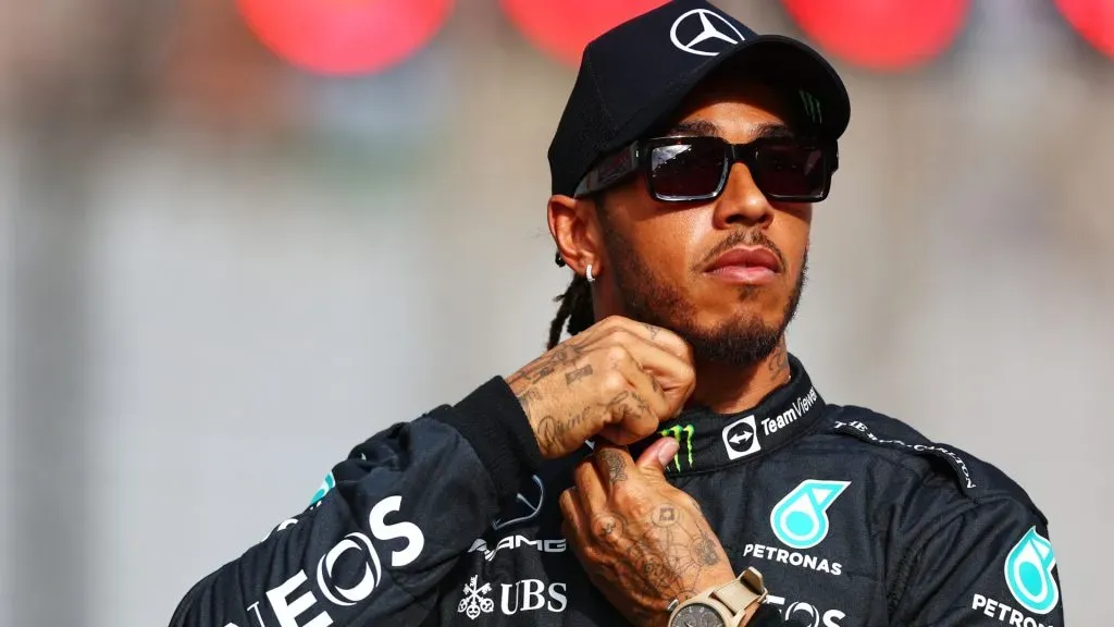 Lewis Hamilton of Great Britain and Mercedes looks on ahead of the F1 2022 End of Year photo prior to the F1 Grand Prix of Abu Dhabi at Yas Marina Circuit on November 20, 2022 in Abu Dhabi, United Arab Emirates. (Photo by Mark Thompson/Getty Images)