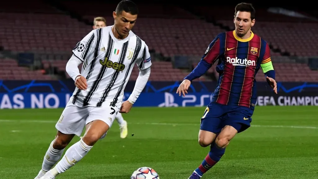 Cristiano Ronaldo of Juventus F.C. is put under pressure by Lionel Messi of Barcelona during the UEFA Champions League Group G stage match between FC Barcelona and Juventus at Camp Nou on December 08, 2020 in Barcelona, Spain.  (Photo by David Ramos/Getty Images)