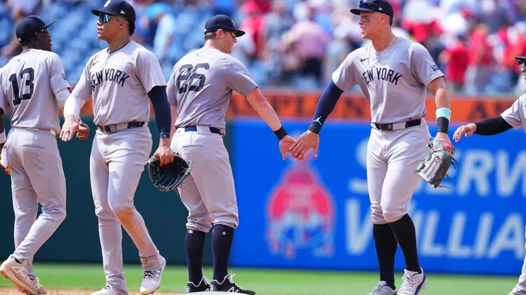 Jazz Chisholm Jr. #13, Juan Soto #22, DJ LeMahieu #26, and Aaron Judge #99 of the New York Yankees celebrate their win against the Philadelphia Phillies at Citizens Bank Park on July 31, 2024 in Philadelphia, Pennsylvania. (Photo by Mitchell Leff/Getty Images)