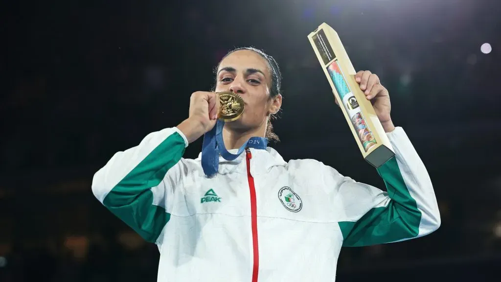 Gold Medallist Imane Khelif of Team Algeria kisses her medal during the Boxing Women’s 66kg medal ceremony after the Boxing Women’s 66kg Final. Richard Pelham/Getty Images