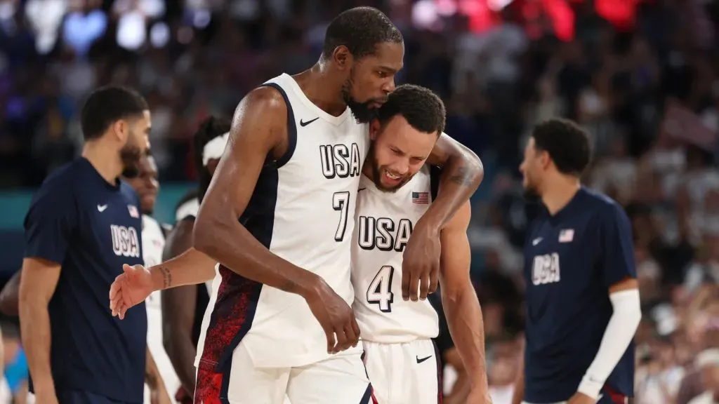 Kevin Durant #7 and Stephen Curry #4 of Team United States react after winning against Team Serbia during a Men’s basketball semifinals match between Team United States and Team Serbia. Ezra Shaw/Getty Images